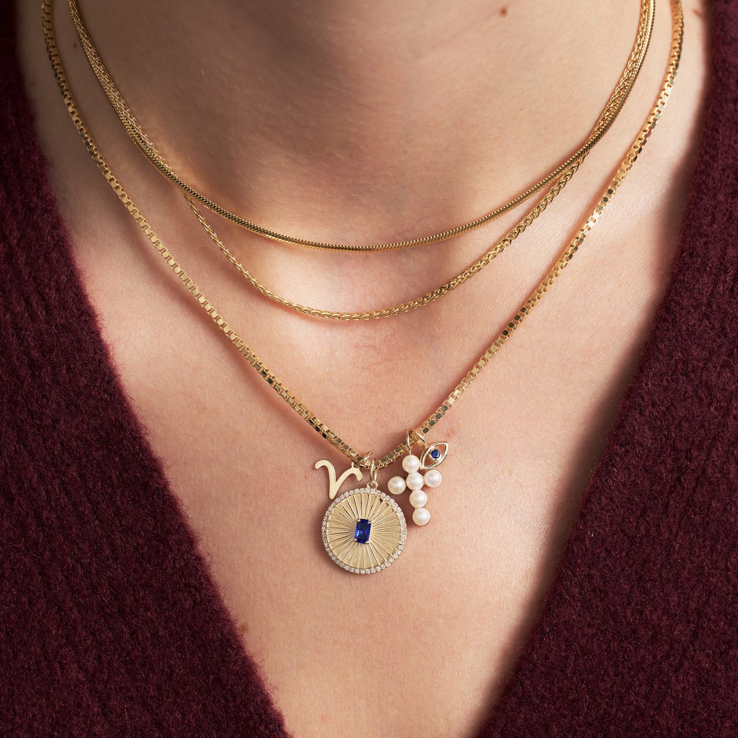 Evil Eye Charm mit blauem Saphir