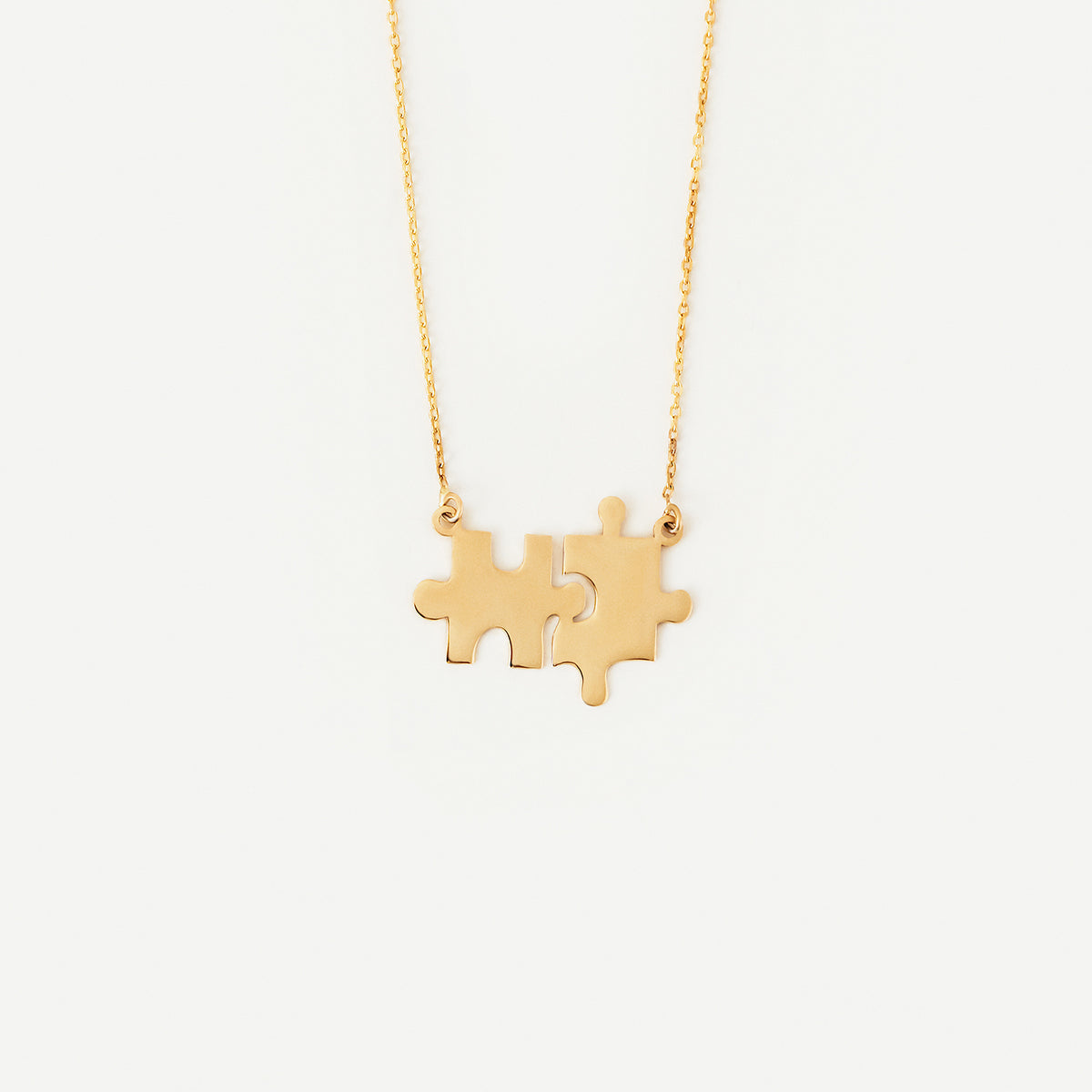 Collier de couple puzzle en or 585