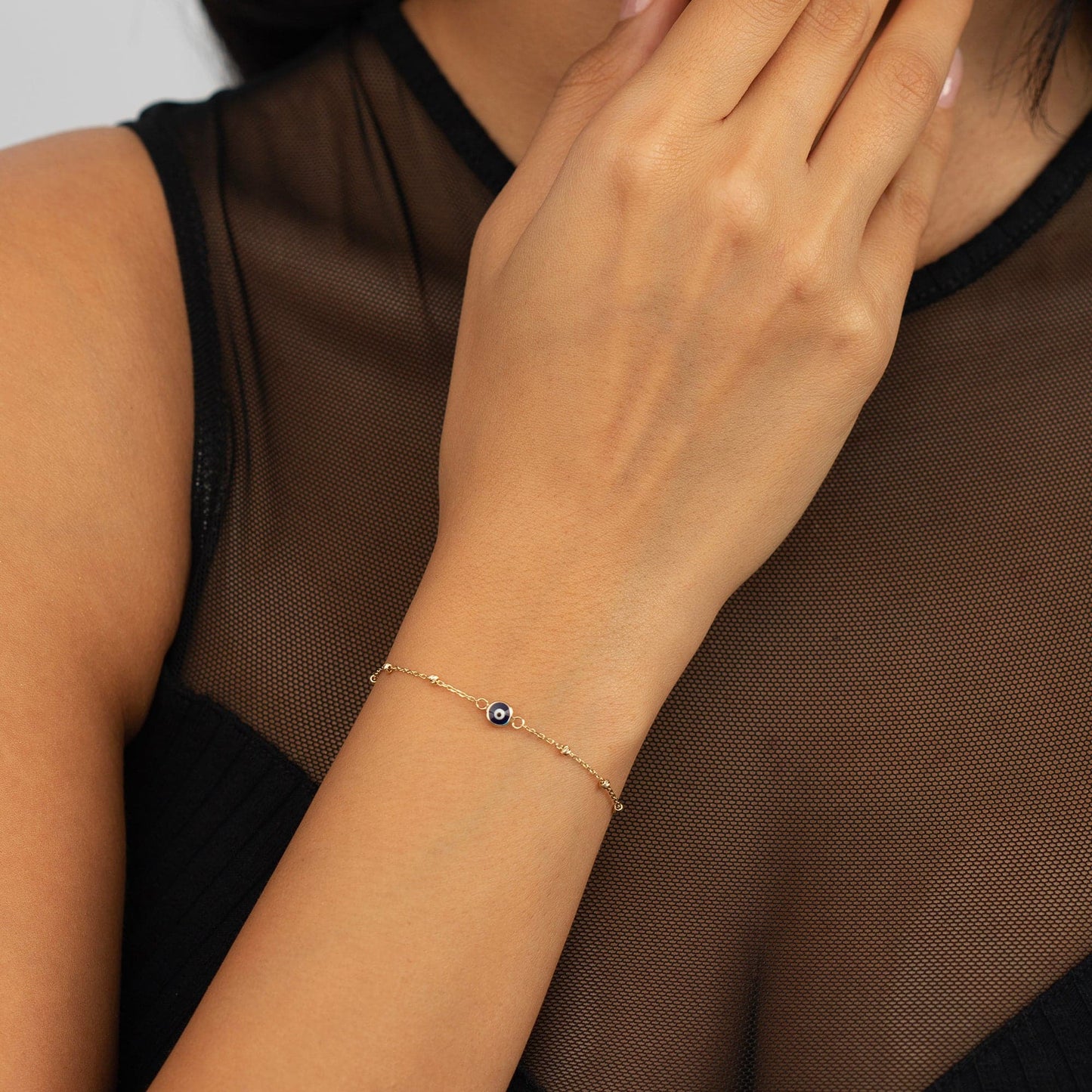 Collier de perles bracelet mauvais œil en or 585