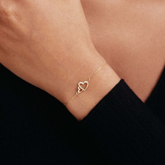 Intertwined heart bracelet in 585 solid gold