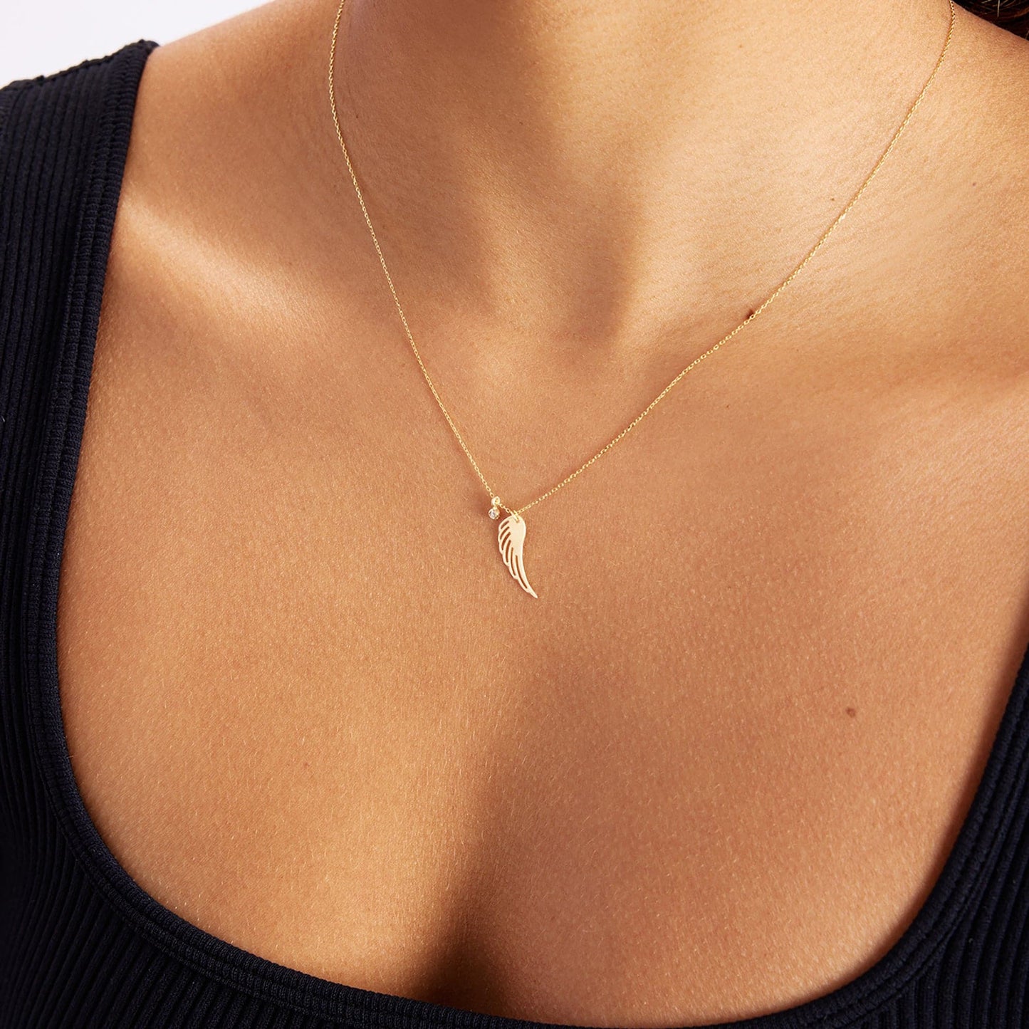 Collier pendentif aile d'ange en diamant en or 585