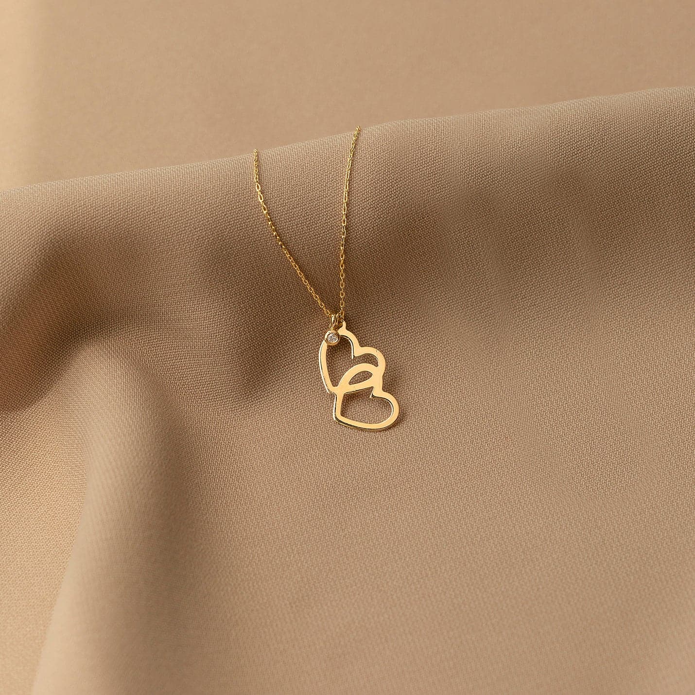Diamond necklace with intertwined heart made of 585 solid gold