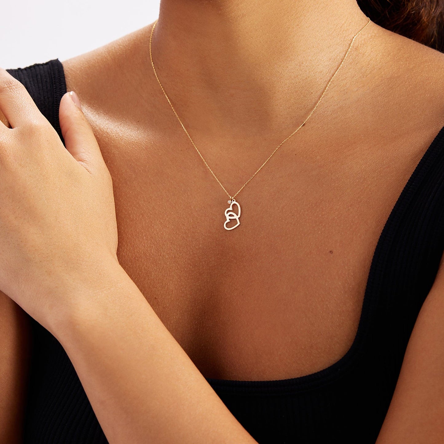 Diamond necklace with intertwined heart made of 585 solid gold