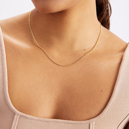 Collier chaîne gourmette en or massif 585