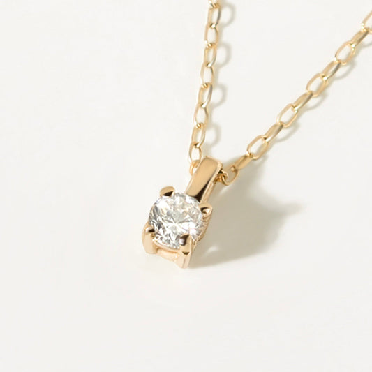 Pendentif diamant rond 4 pierres en or blanc 585 avec solitaire