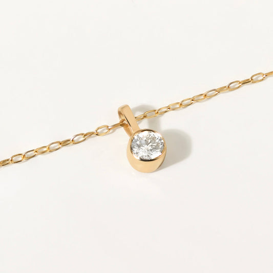 Collier pendentif solitaire diamant avec lunette en or jaune 585