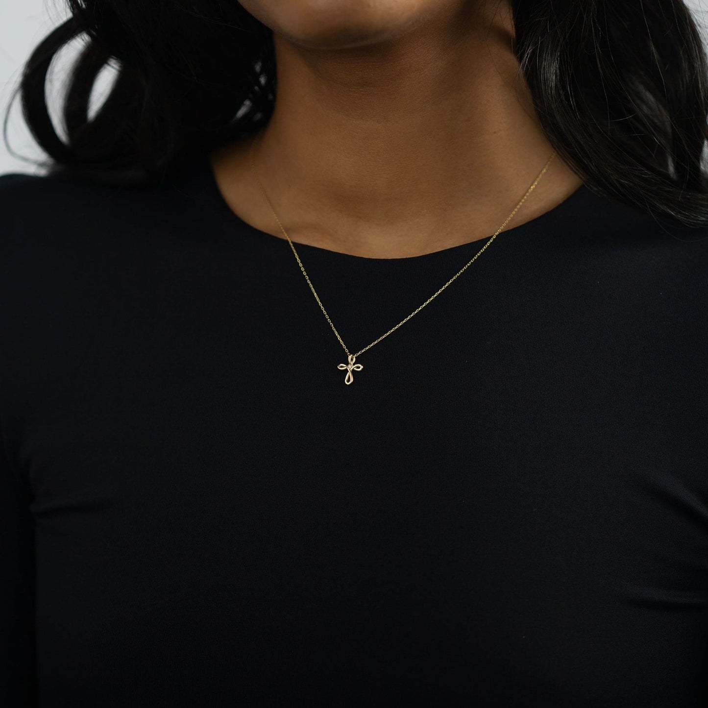 diamond cross infinity necklace made of 585 yellow gold