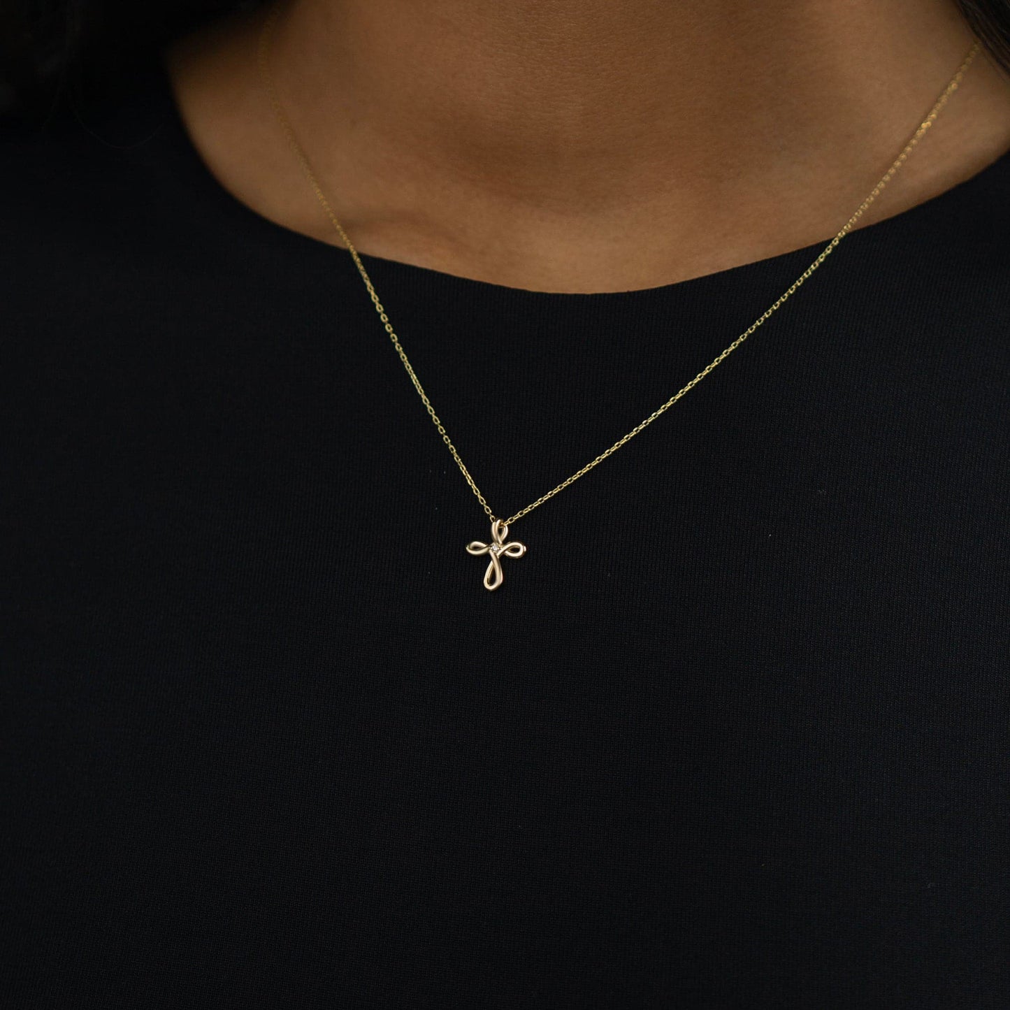 diamond cross infinity necklace made of 585 yellow gold