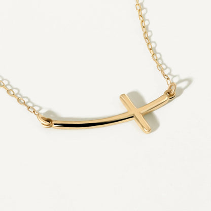 Sideways curved cross necklace made of 585 gold