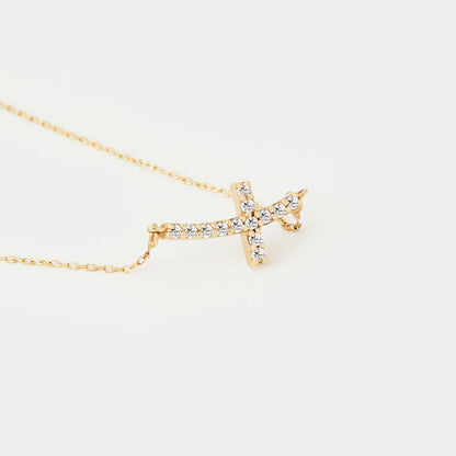 Collier croix courbée en diamants en or 585