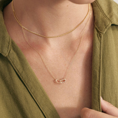 Collier entrelacé trombone diamant en or massif 18 carats.