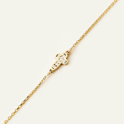 Tiny diamond cross bracelet made of 14K gold