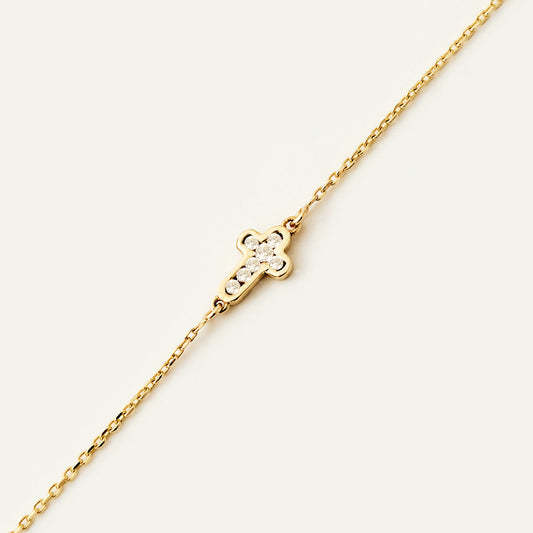 Tiny diamond cross bracelet made of 14K gold