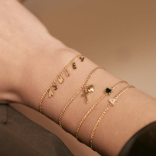 Bracelet à breloques croix et cœur en or massif 585